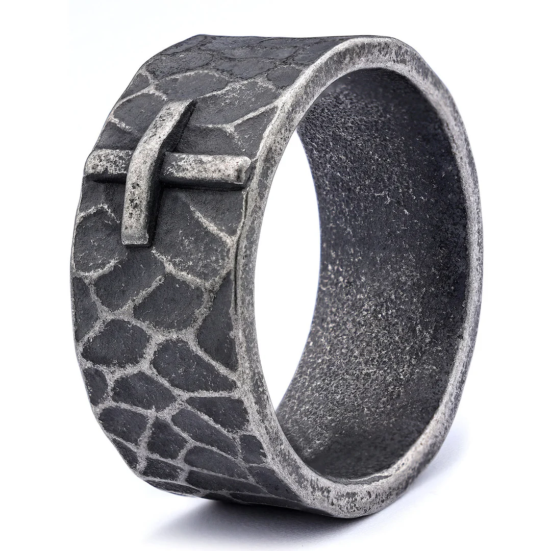 Hand-carved stone cross ring carries His gentle protection
